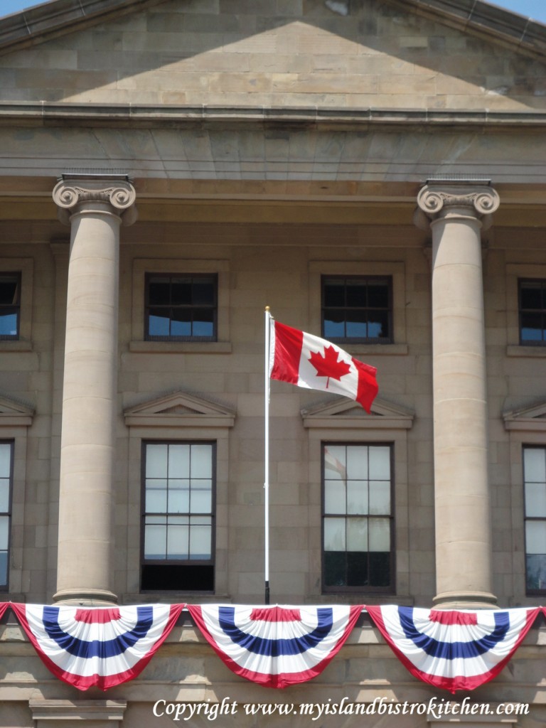 The Canada Flag flies at Province House in Charlottetown, PEI