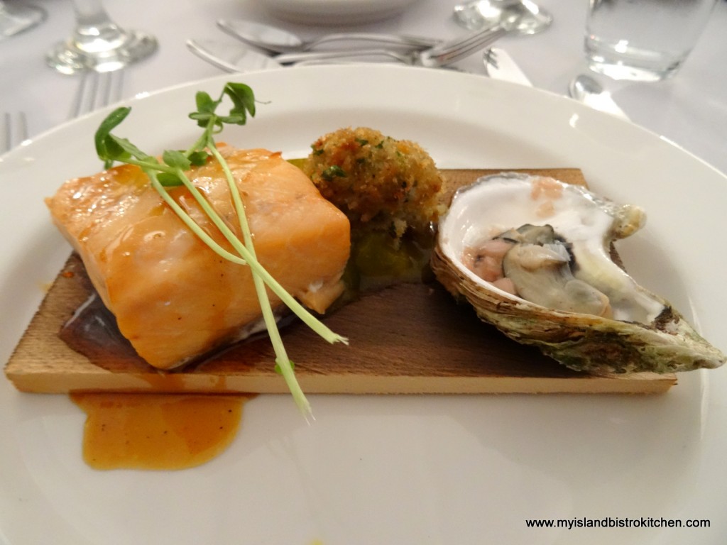 Second Course: Cedar Planked Maple Cured Salmon, Rock Crab Rissole, Mustard Pickle, and Roasted Oyster