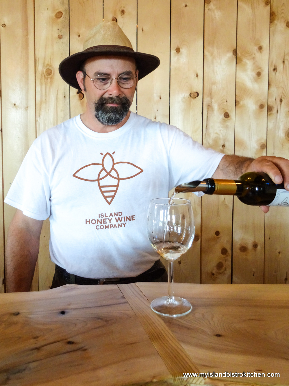 Charles Lipnicki pours a sample of one of his honey meads made at Island Honey Wine Company in Wheatley River, PEI