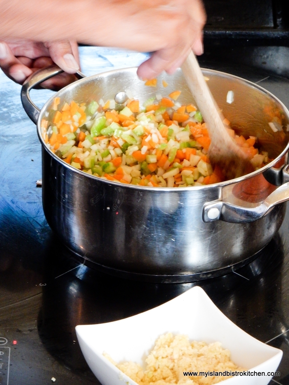 Stirring the Mirepoix for the Lobster Bisque at The Table Culinary Studio, New London, PEI