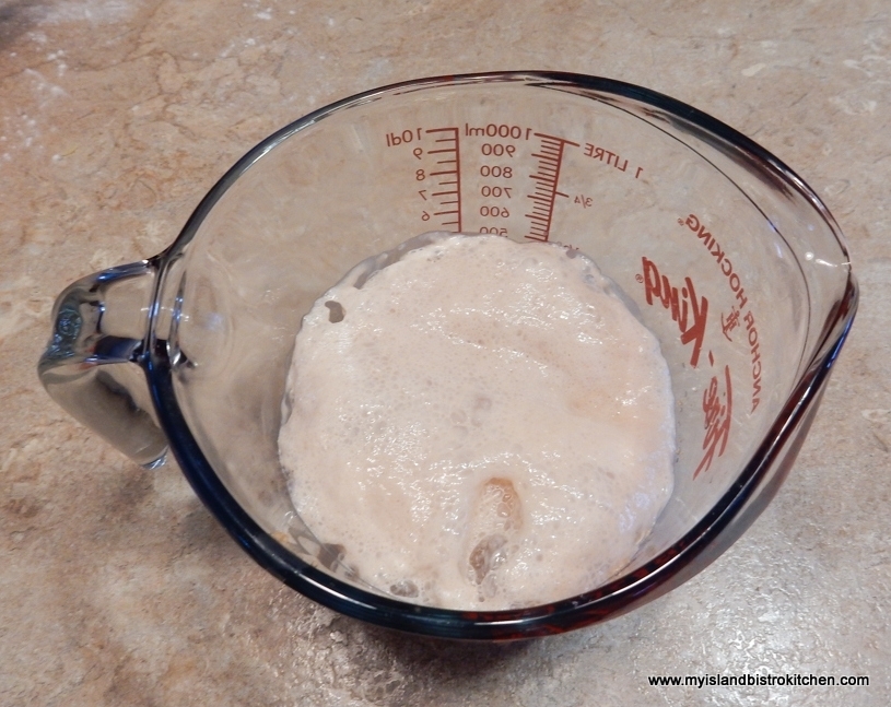 Measuring cup with proofed yeast