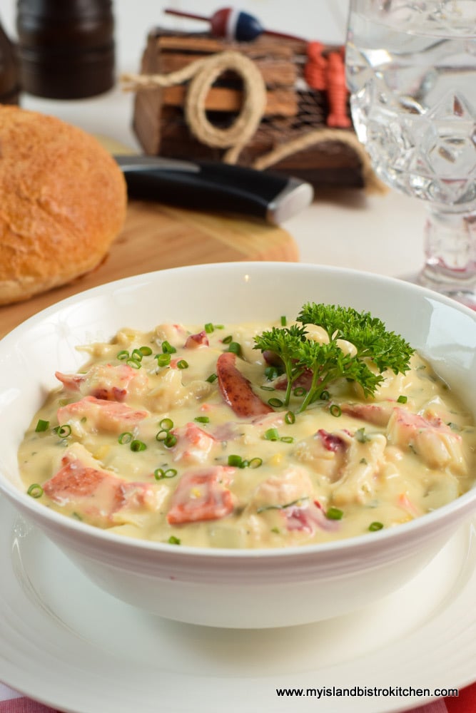 Bowl of Chowder Filled With Lobster, Potatoes, and Creamed Corn