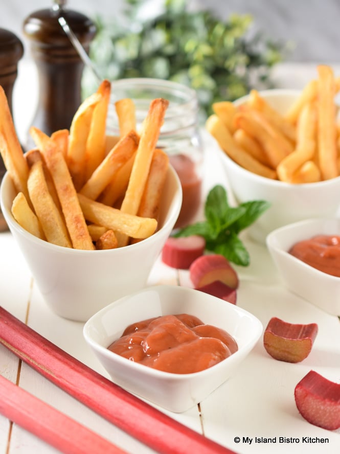 Containers of French Fries and Dishes of Homemade Rhubarb Tomato Ketchup