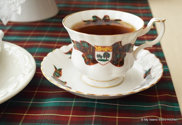 Cup and Saucer with PEI Coat of Arms and PEI Tartan