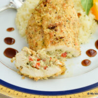 Stuffed Chicken Breast with delectable cheese, vegetable, and basil pesto filling