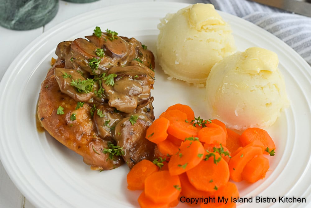 Skillet Chicken Cutlets Served with Mashed Potato and Carrots