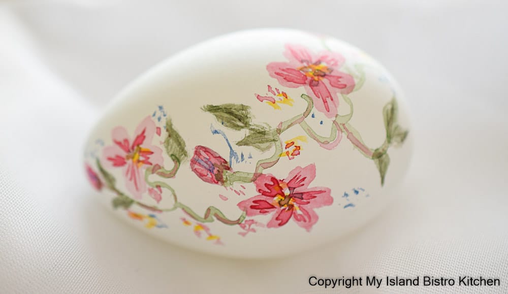 Handmade Easter egg in shades of pink and green