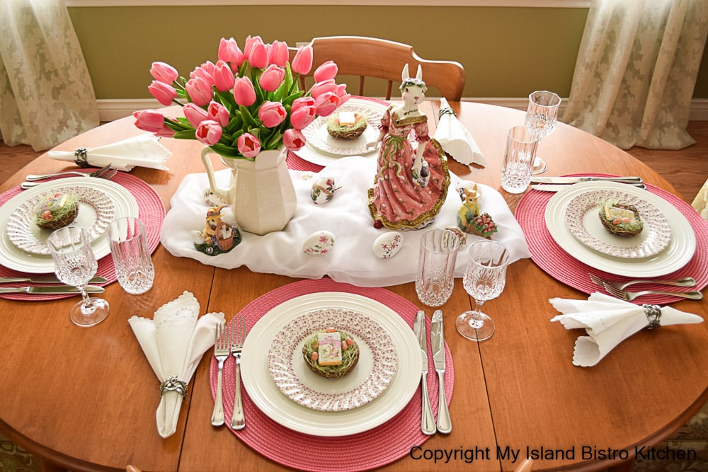 Overview of pink-themed Easter tablescape