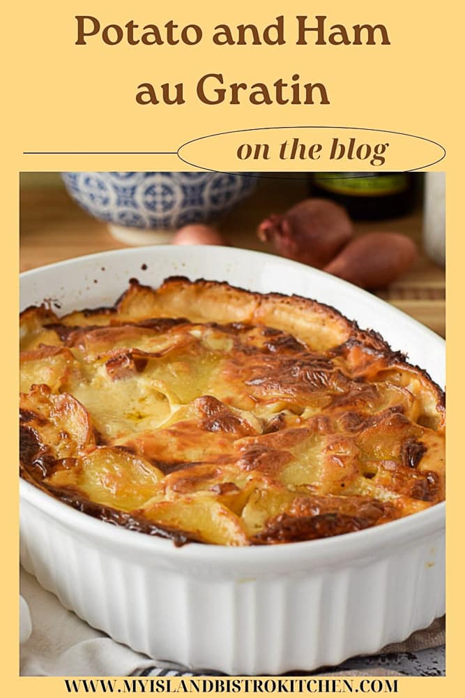 Casserole filled with Potato and Ham Baked in a Cheese Sauce