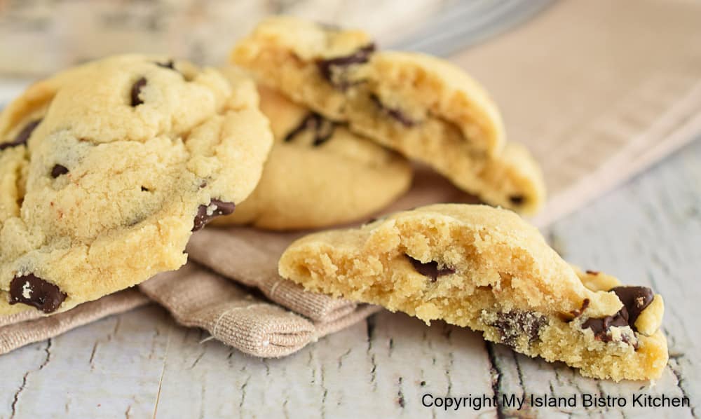 Broken apart cookie shows soft internal texture of cookie
