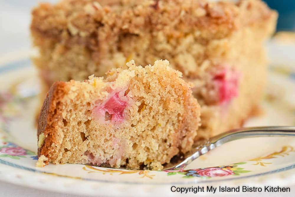 Close-up of bite of coffee cake sitting on fork