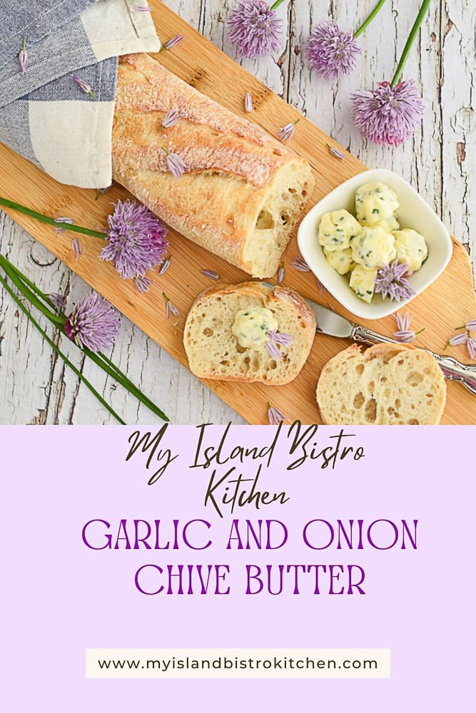 Baguette on Breadboard with Small Bowl of Compound Butter