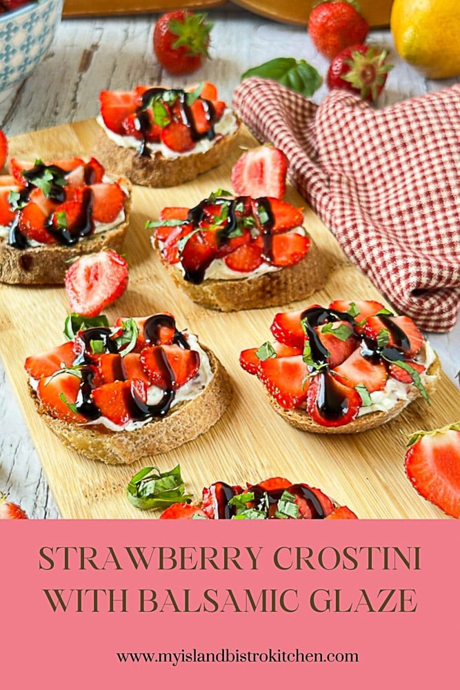 Strawberry appetizers sit atop wooden board