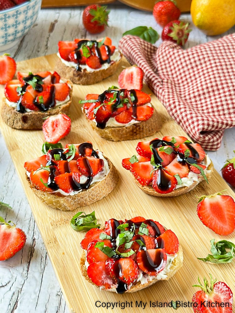 Wooden board filled with Strawberry Hors d'oeuvres