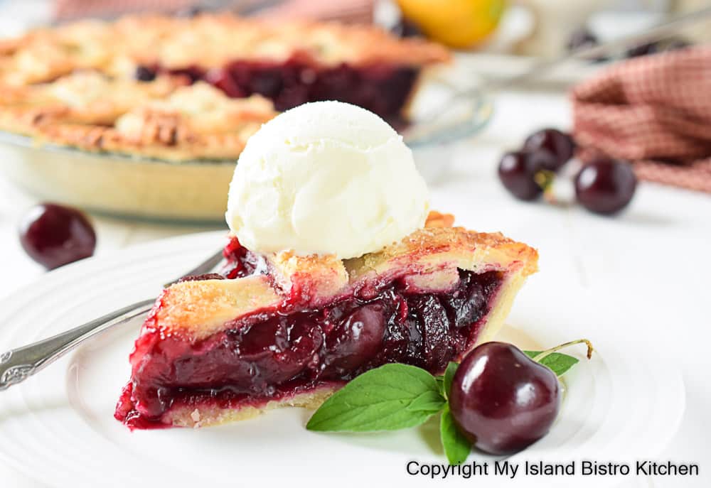 Cherry Pie Topped with a Scoop of Vanilla Ice Cream