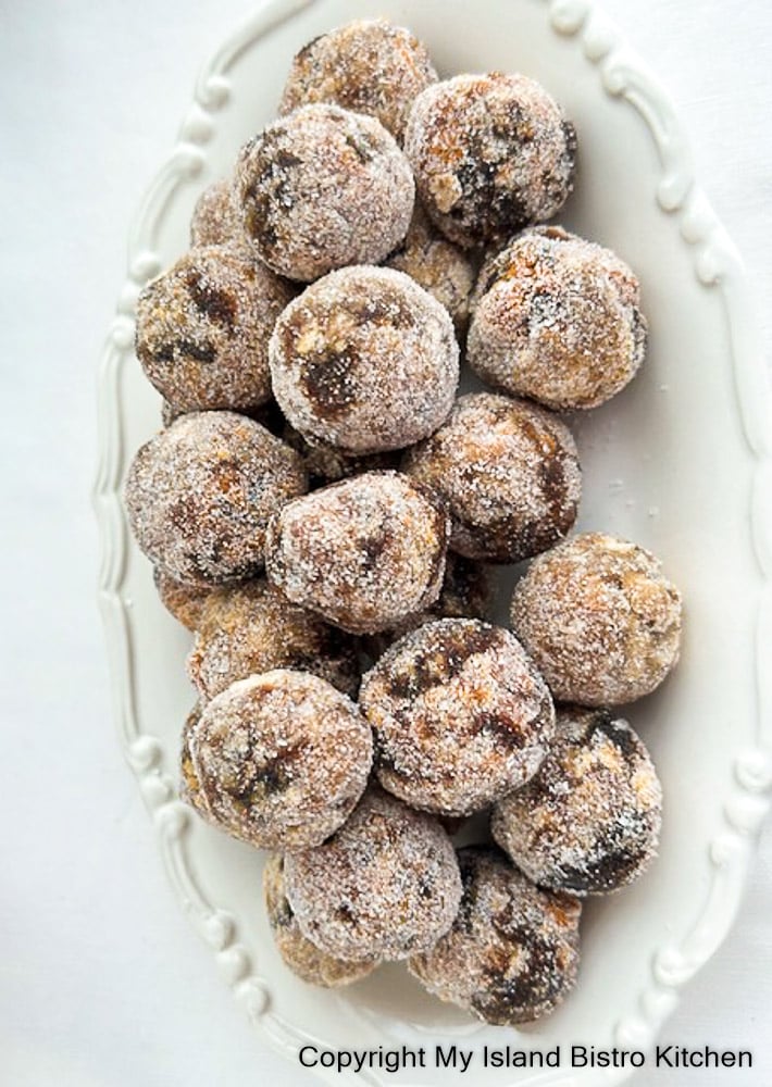 White plate filled with date and nut balls